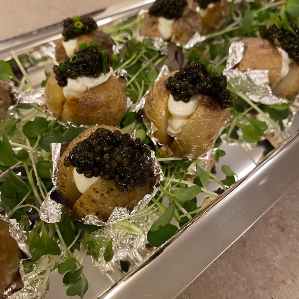 Black River Caviar served with Baked Potatoes and Silver Leaf at Tenmile Distillery