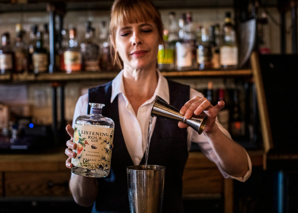 Bartender Pouring Gin into Cocktail Shaker