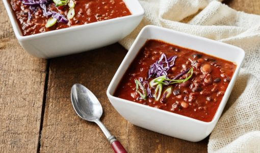 Bowls of Chili Soup with a spoon