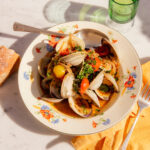 bowl of clams on a set table