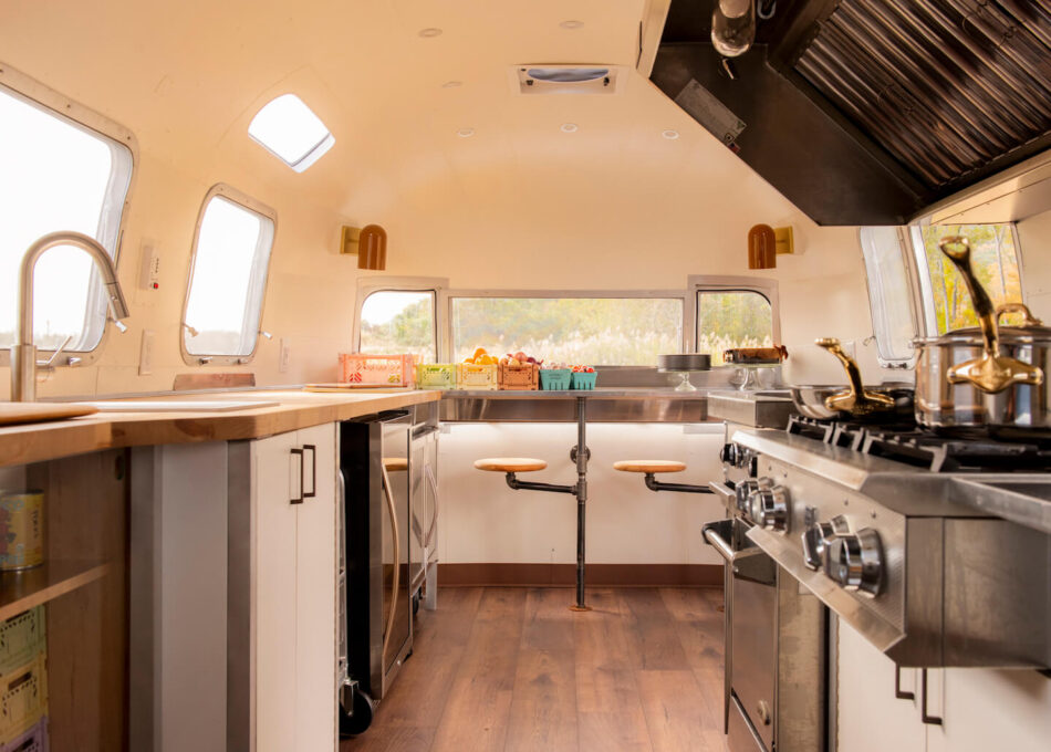 the interior of a renovated airstream food truck